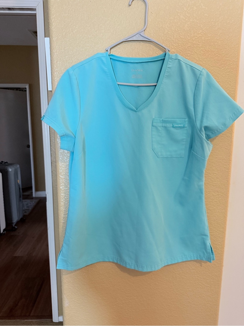 Jaanuu Women's V-Neck Short Sleeve Top in Aqua